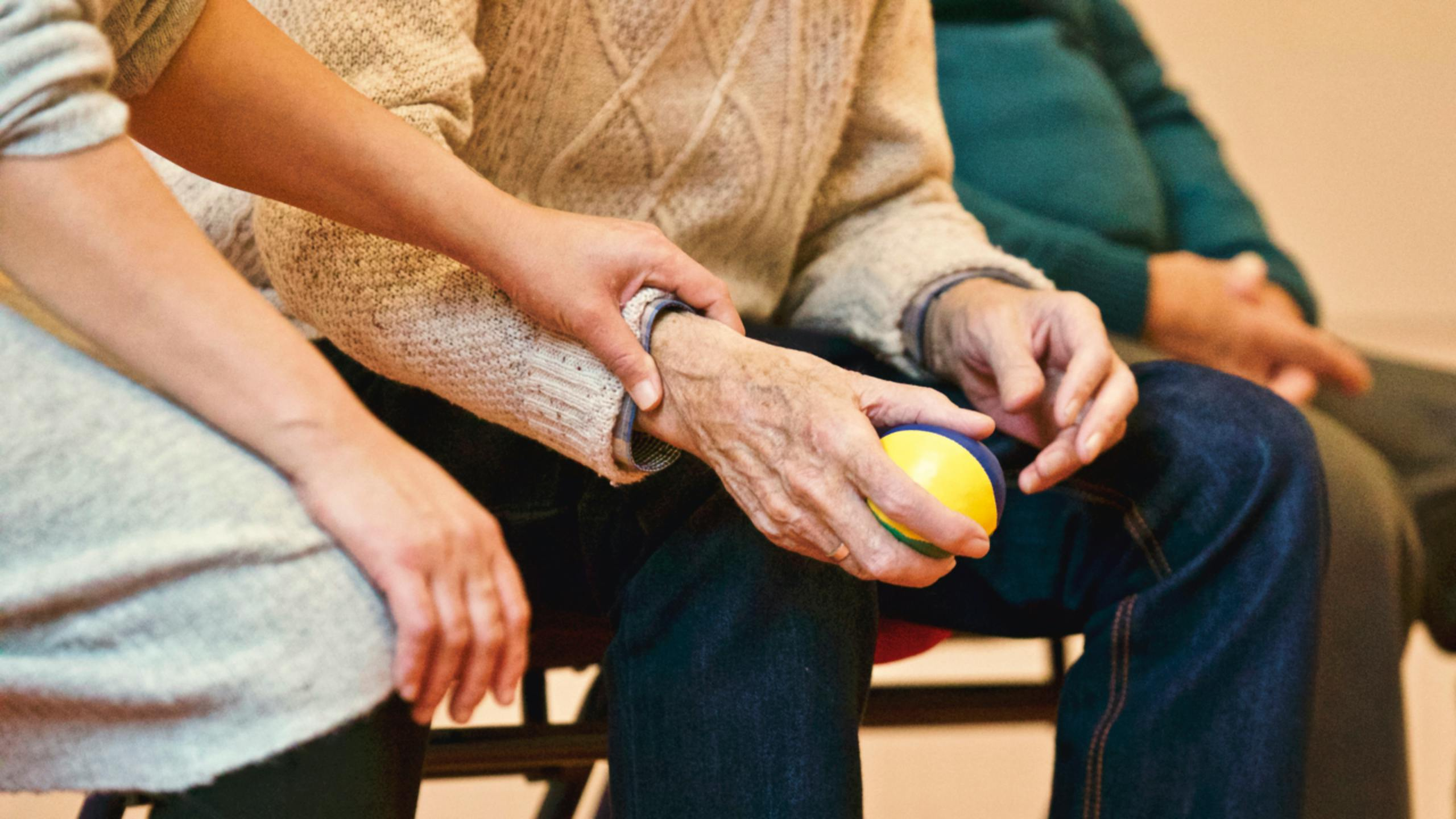 Caregiver taking a quiet restful moment with warm hands